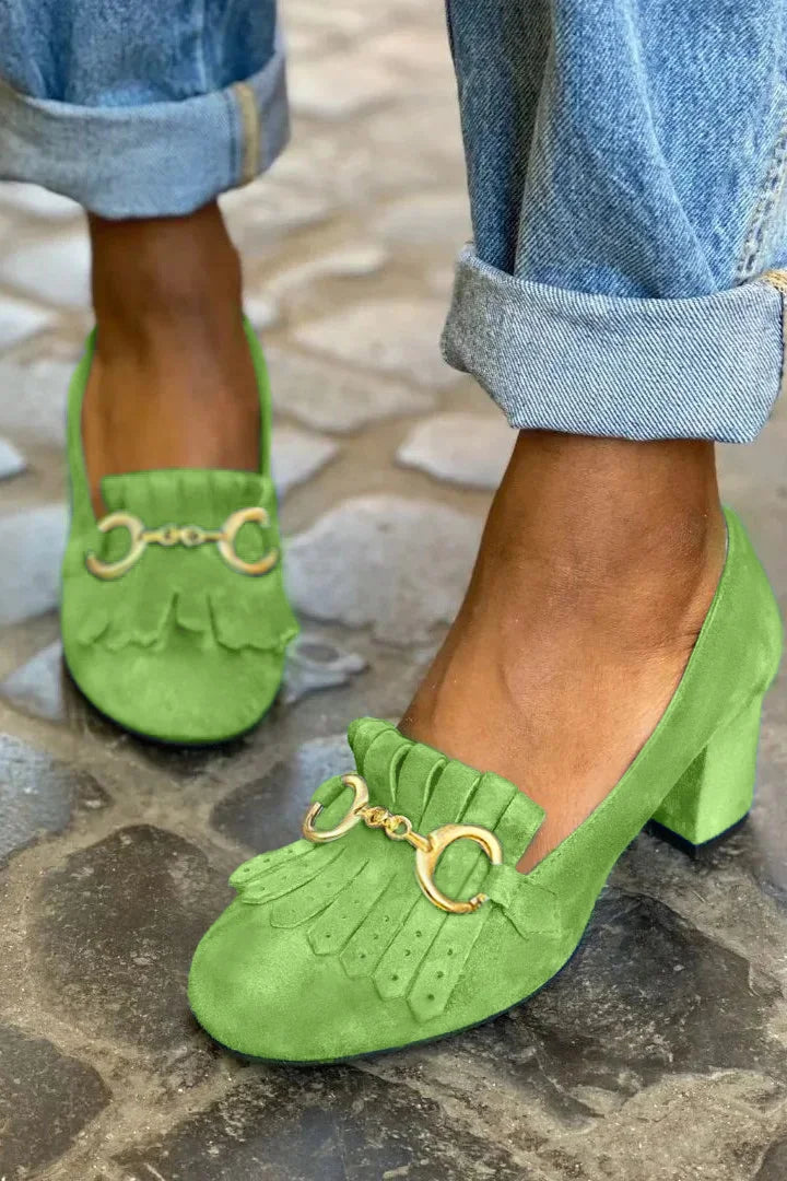 DÉCOLLETÉ CON DETTAGLIO FRANGIA E FIBBIA ORO